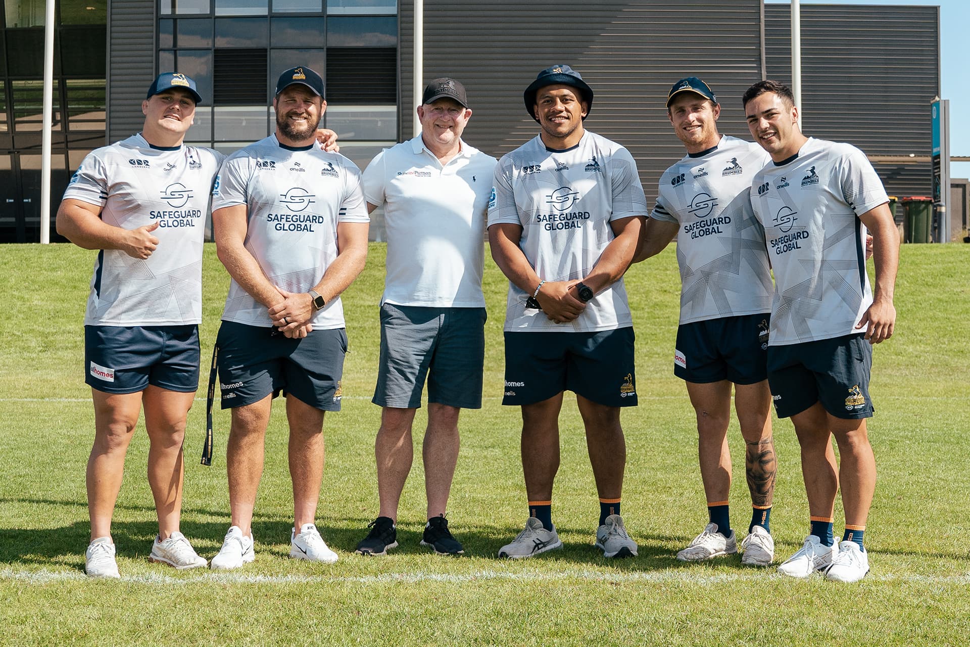 Shaw and Partner's State Manager Stephen Johnston with Blake Schoupp, James Slipper, Allan Alaalatoa, Corey Toole and Klayton Thorn.