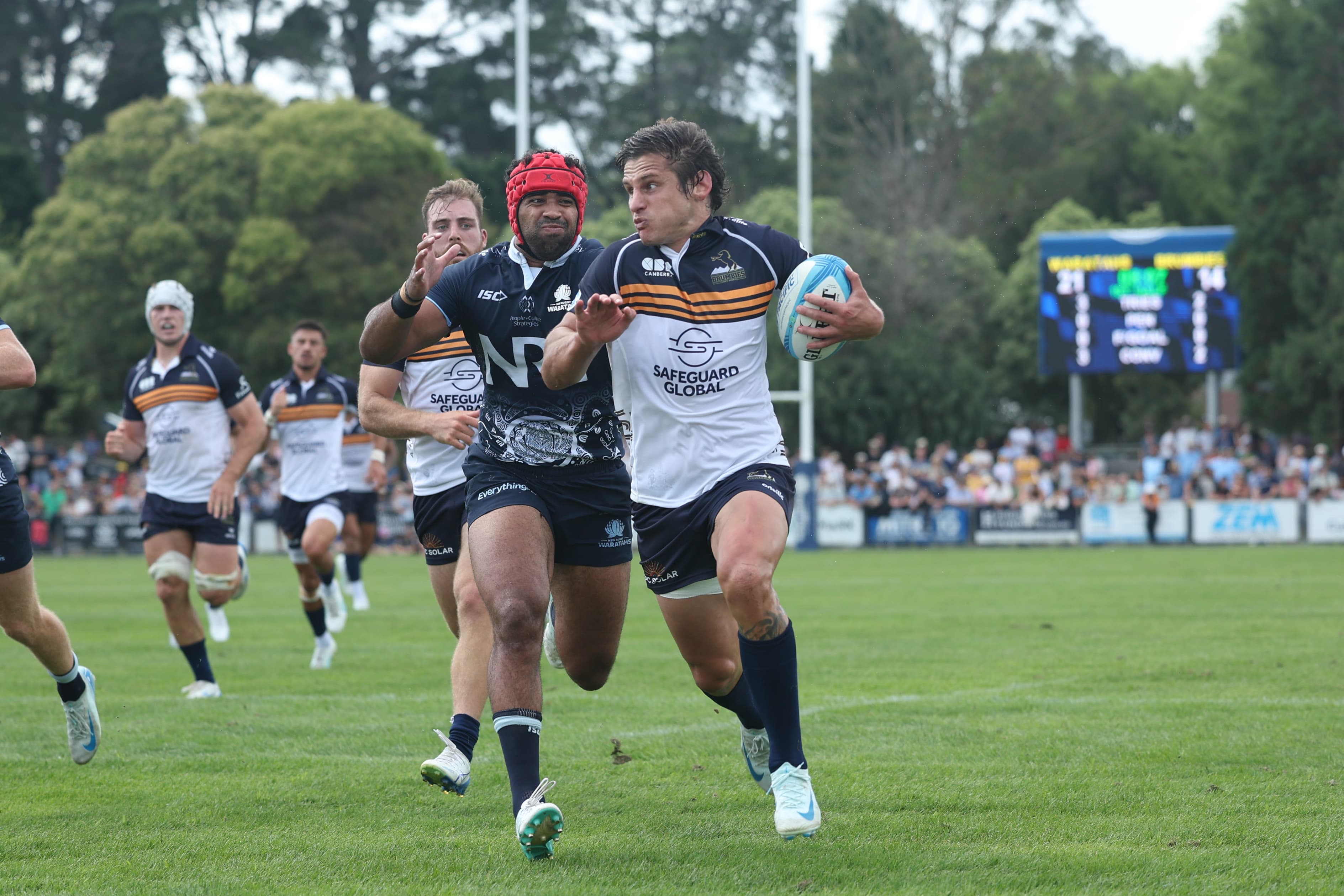 Ollie Sapsford scores against the NSW Waratahs