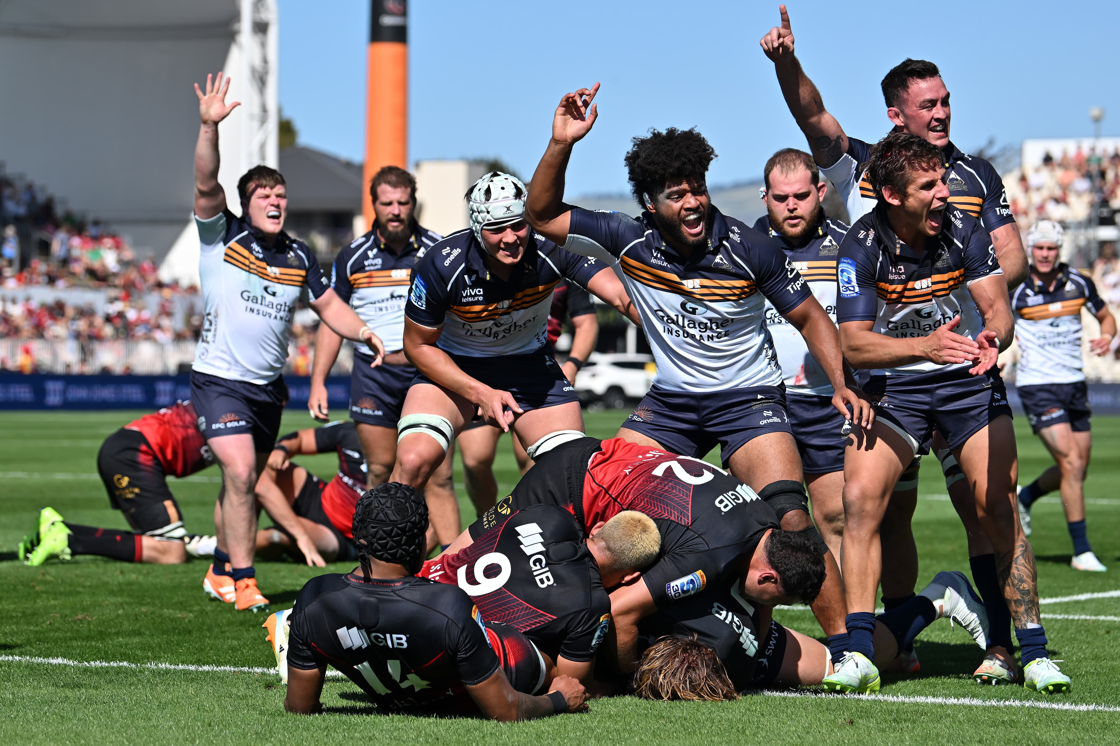 Brumbies celebrate a famous victory vs the Crusaders