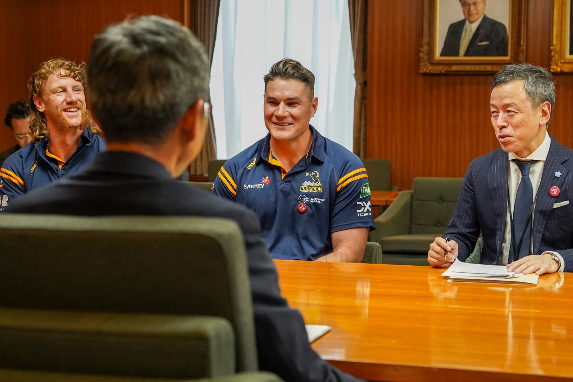 Ben Mowan and Ben O'Donnell converse with Sapporo CIty Mayor Katsuhiro Akimoto