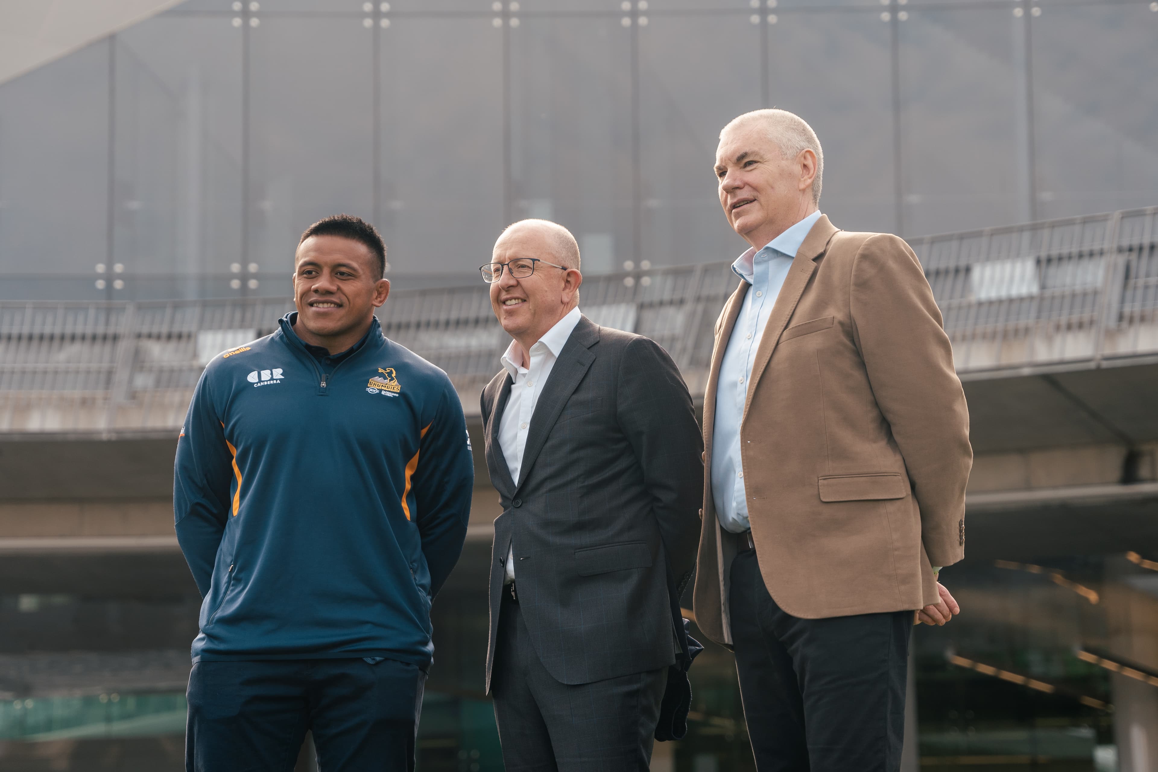 Allan Alaalatoa, Michael Thomson and Phil Thomson at Canberra Airport