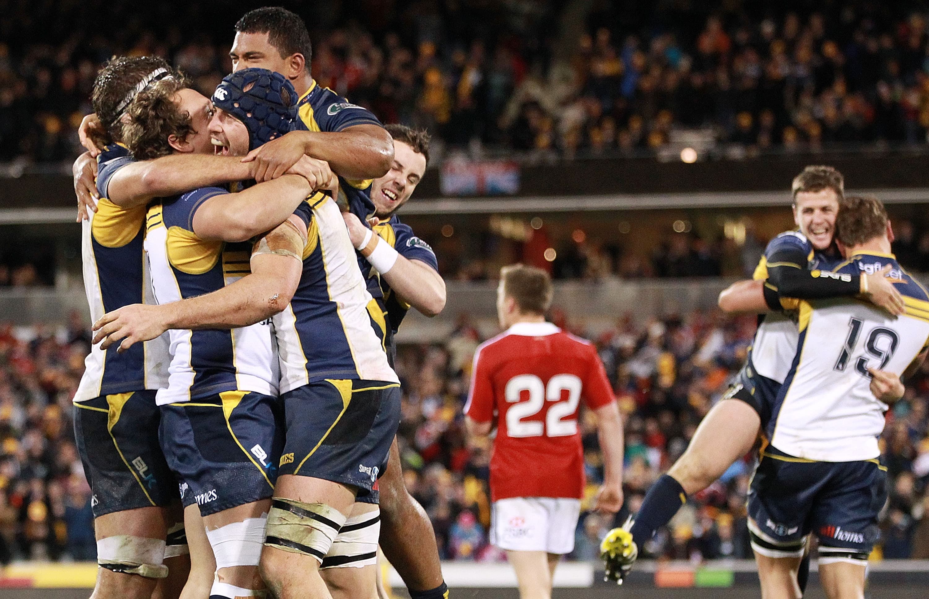 The ACT Brumbies celebrate on full-time
