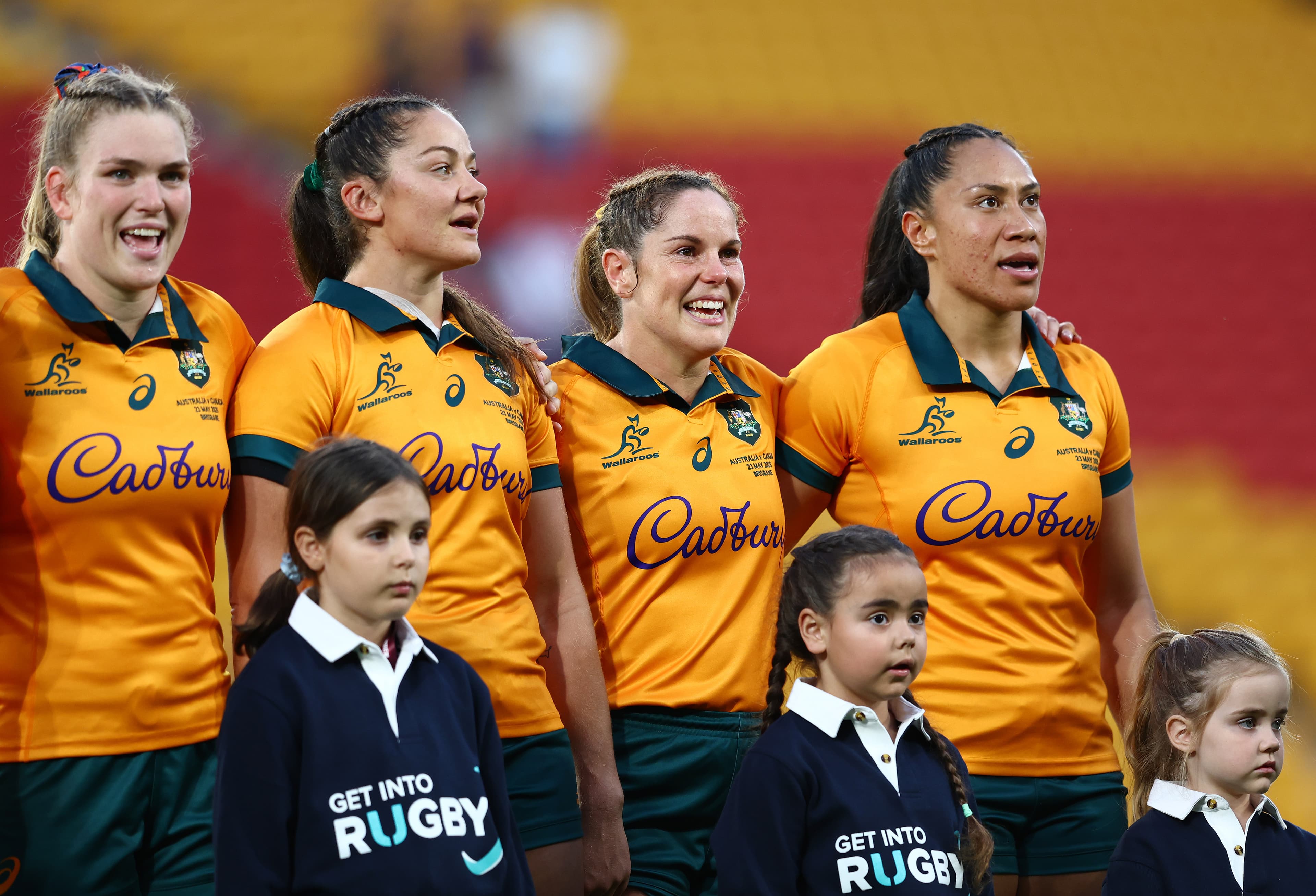 Wallaroos captain Siokapesi Palu (far right) has re-signed with Rugby Australia. Photo: Getty Images