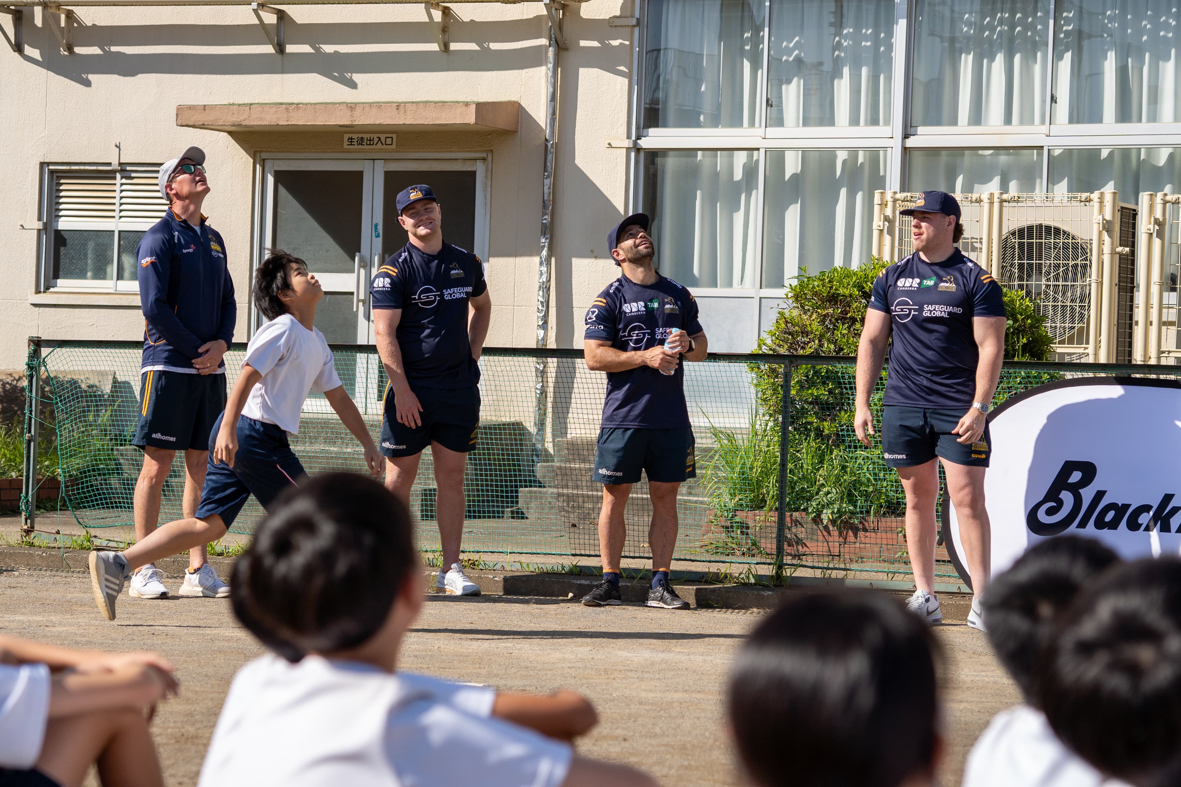 Safeguard Global ACT Brumbies Head Coach Stephen Larkham, Liam Bowron Pedro Rolando and Harry Vella watch on.