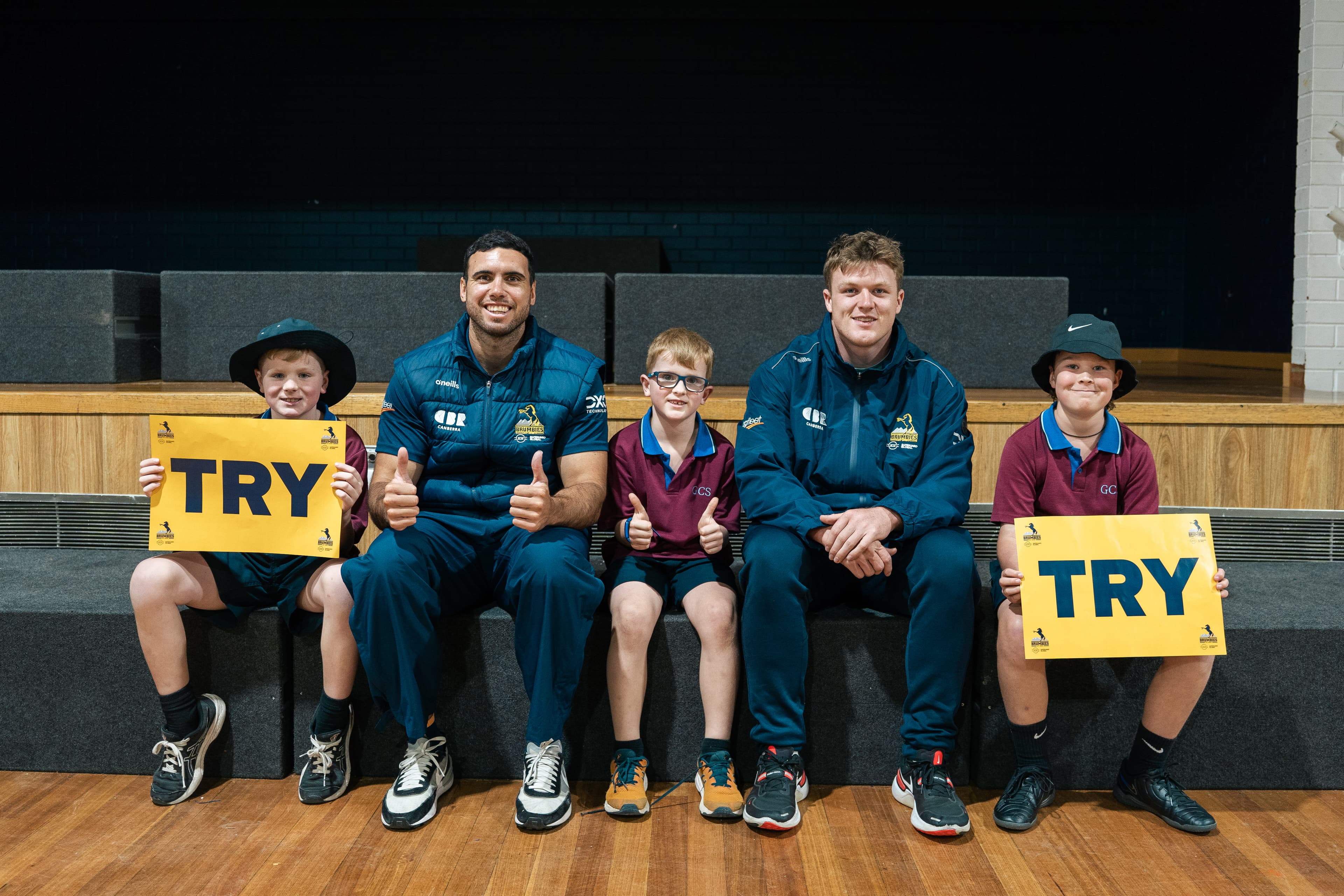 Jack Debreczeni and Billy Pollard with Gold Creek Primary students.
