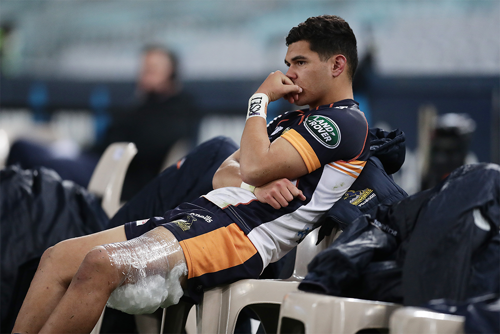 Noah Lolesio was forced from the field in the first half against the NSW Waratahs. Photo: Getty Images